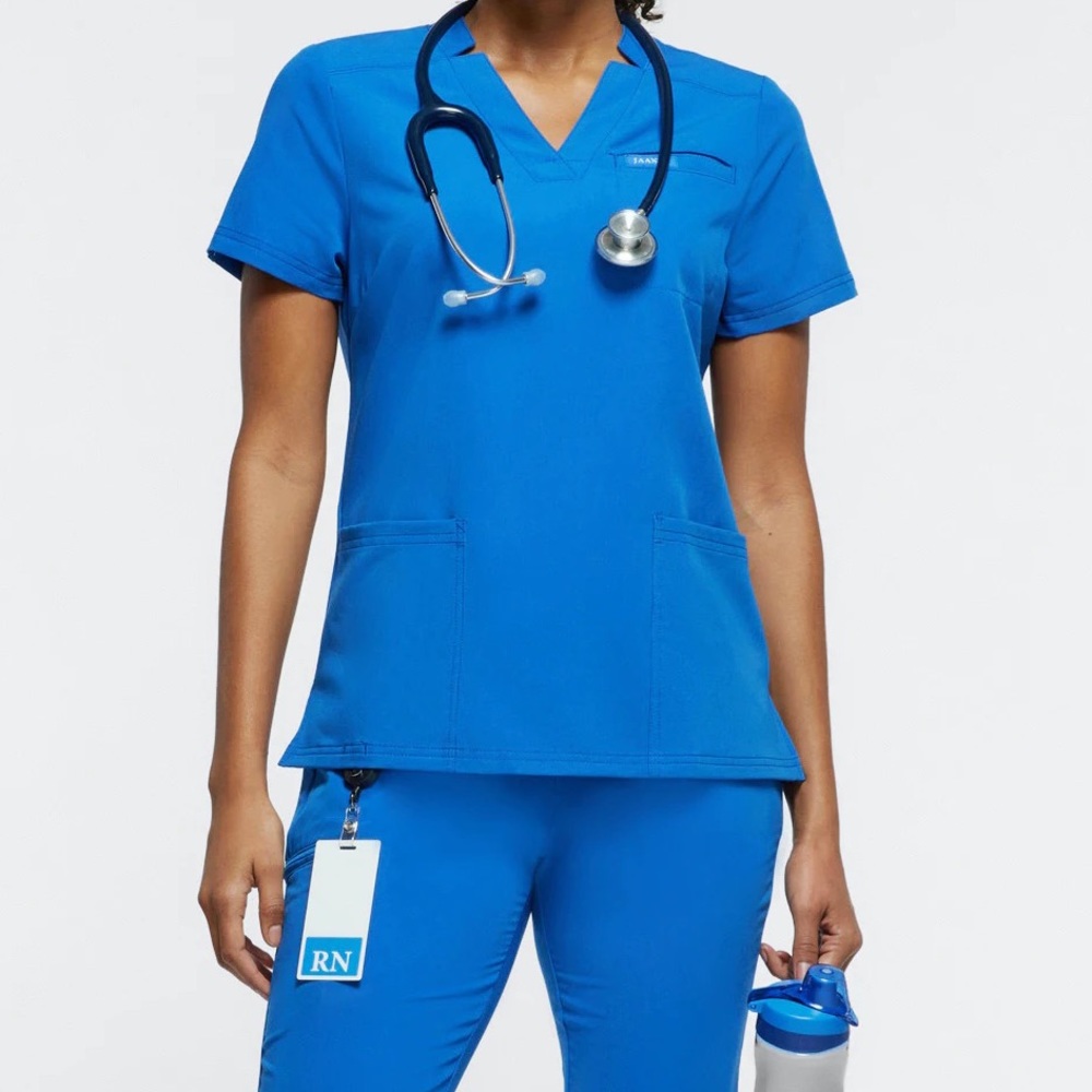 Jaanuu women’s relaxed 3 pocket top